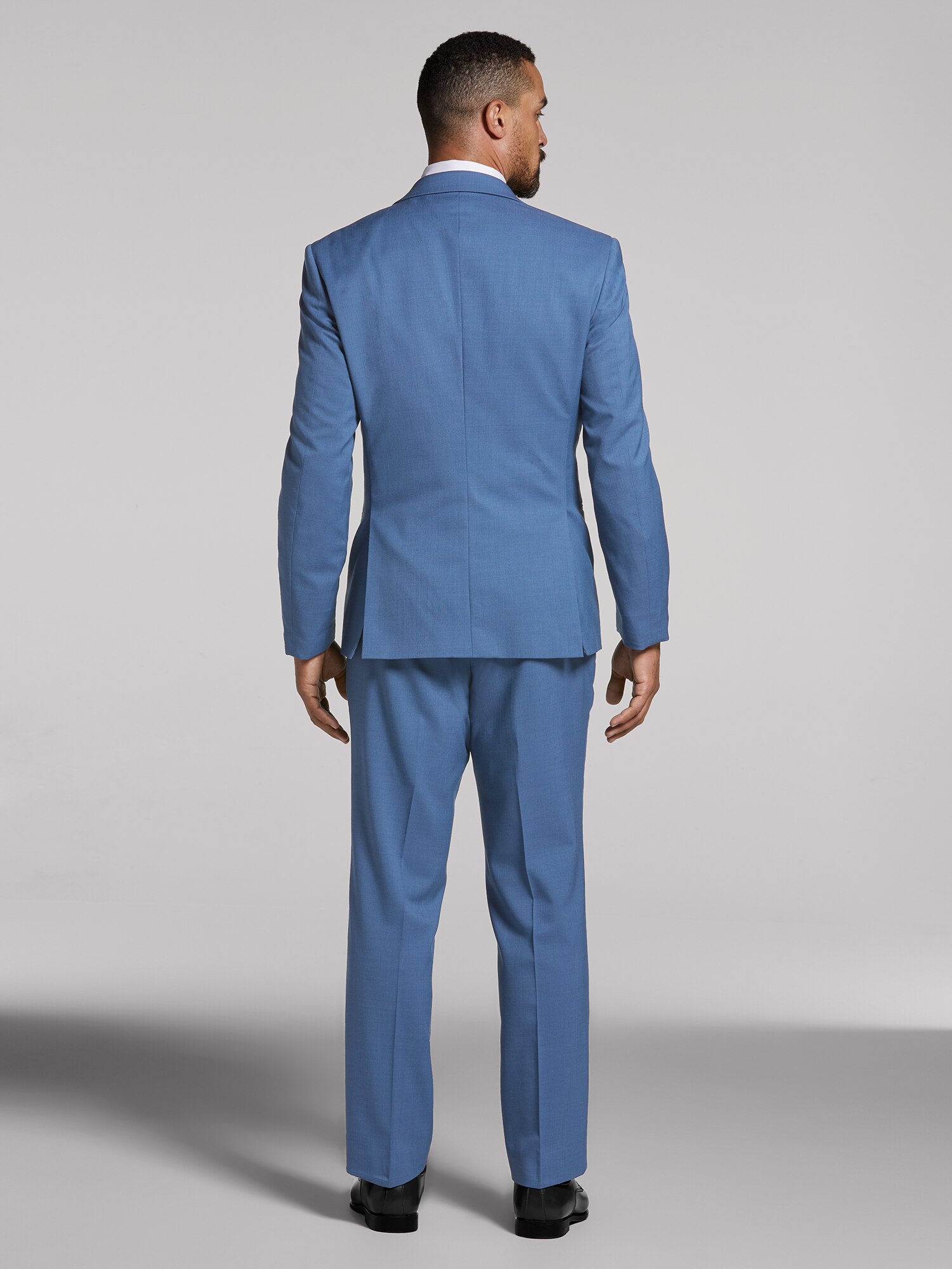 Blue Performance Wedding Suit by Calvin Klein | Suit Rental